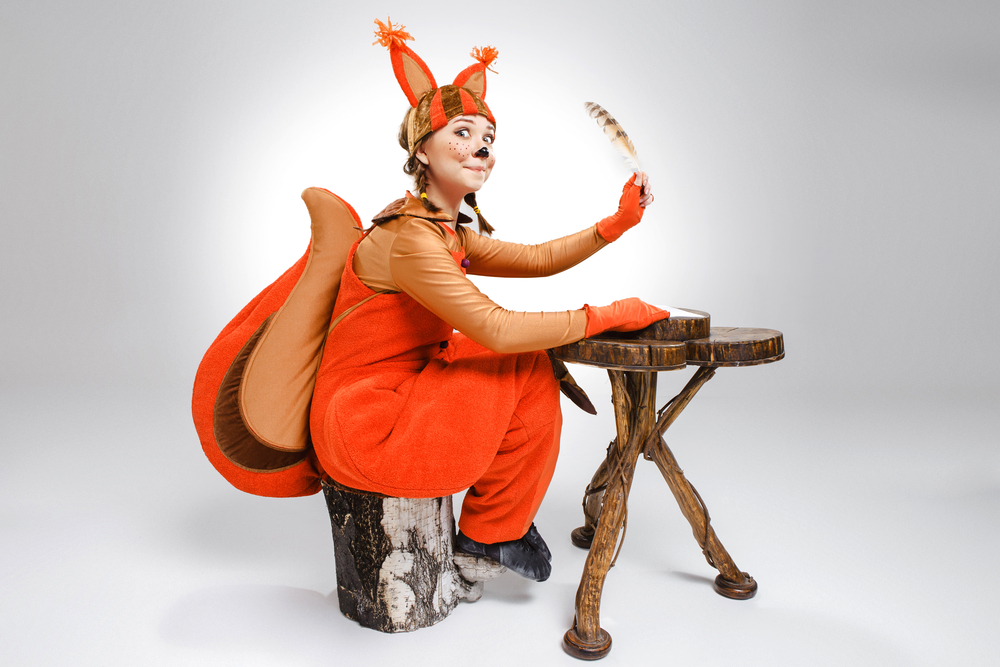 squirrel nuts wildlife photography red grey furry tree person costume write