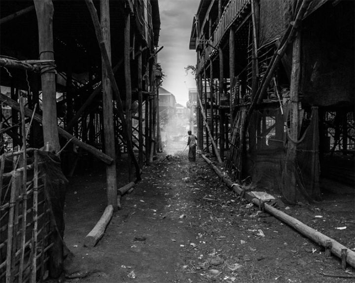 black and white documentary wood steam smoke urban