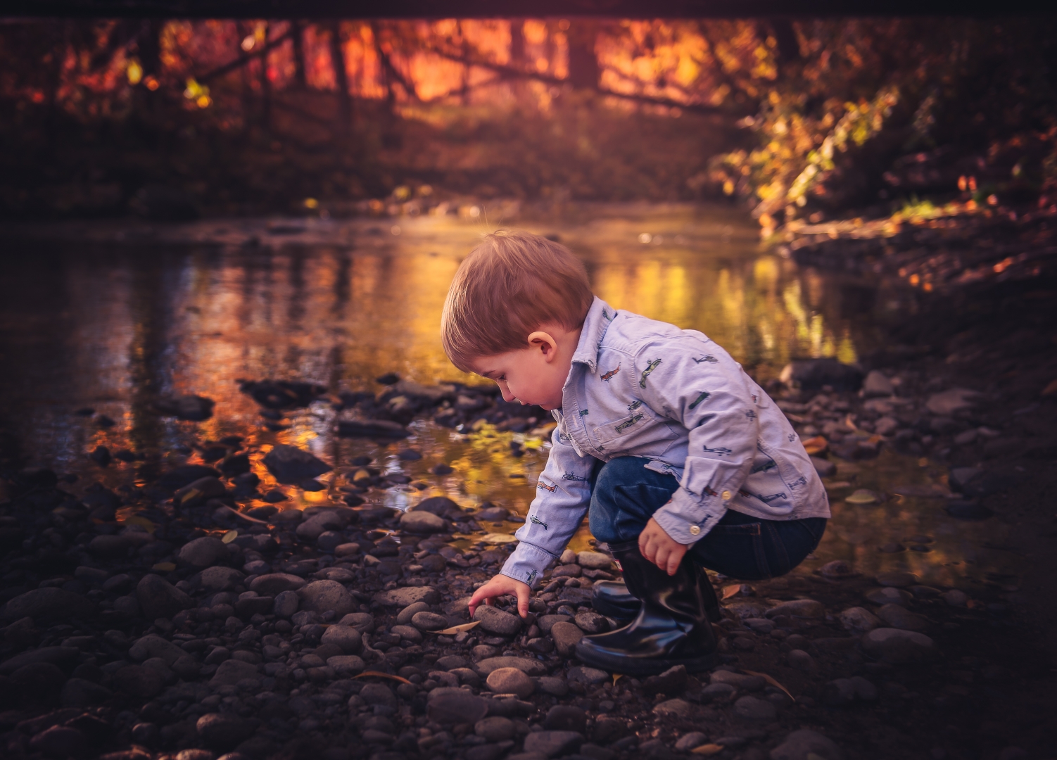 child rocks river water