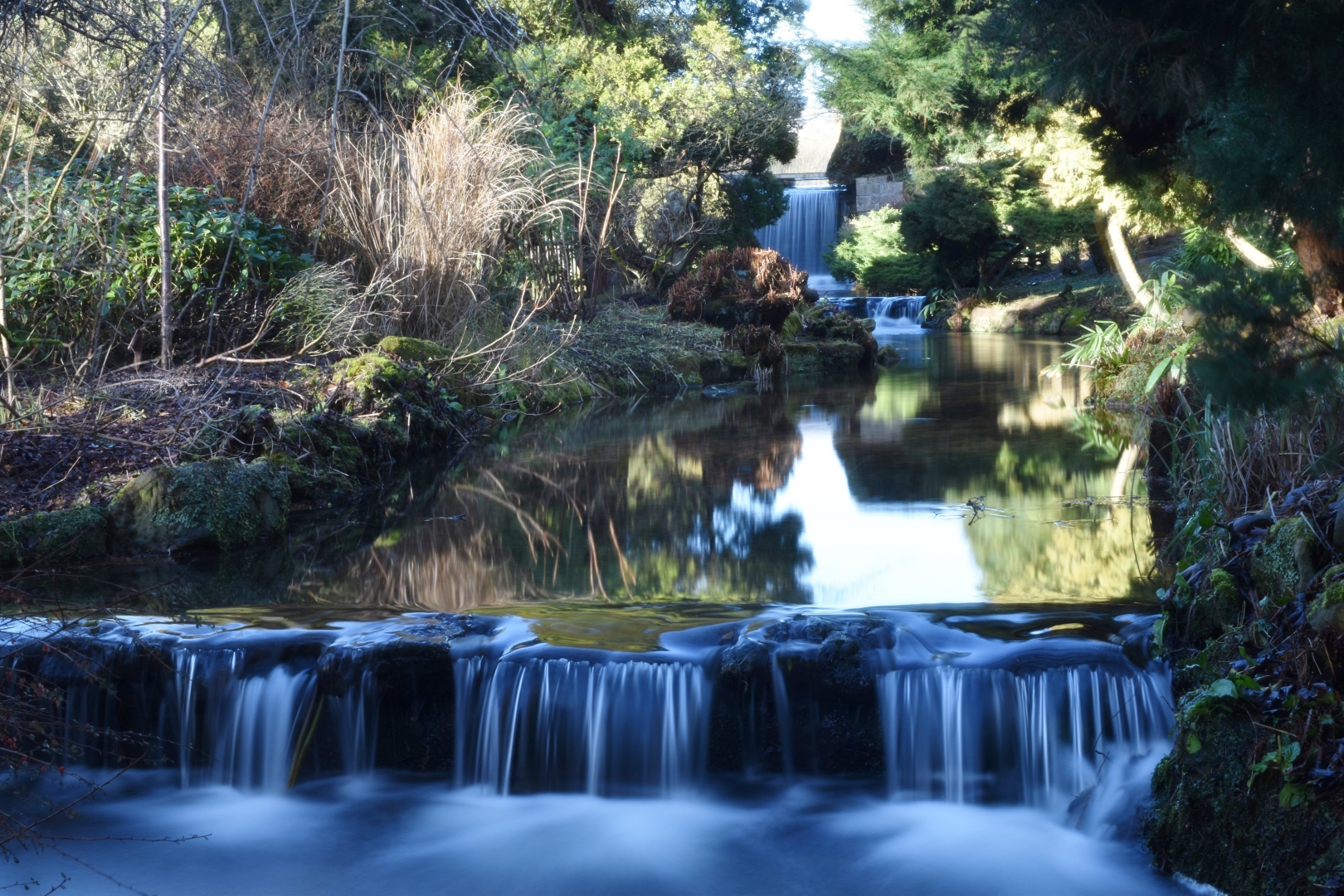 waterfall long exposure calm white blue green stream