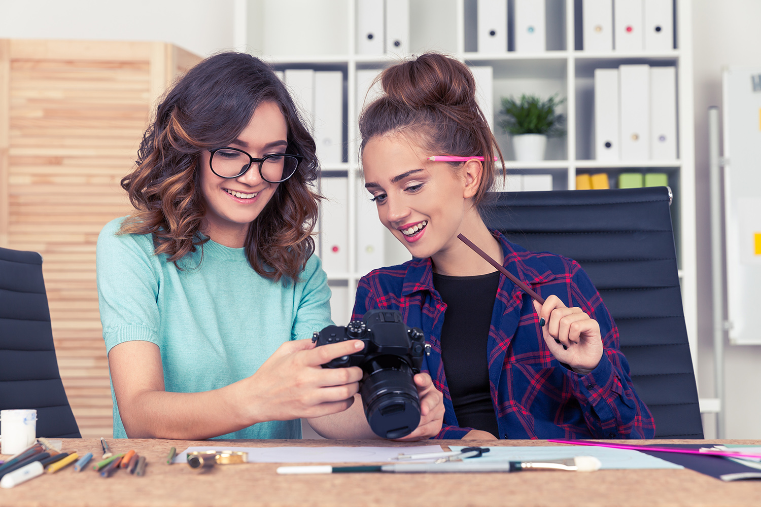 female ladies camera desk work photographers creative block