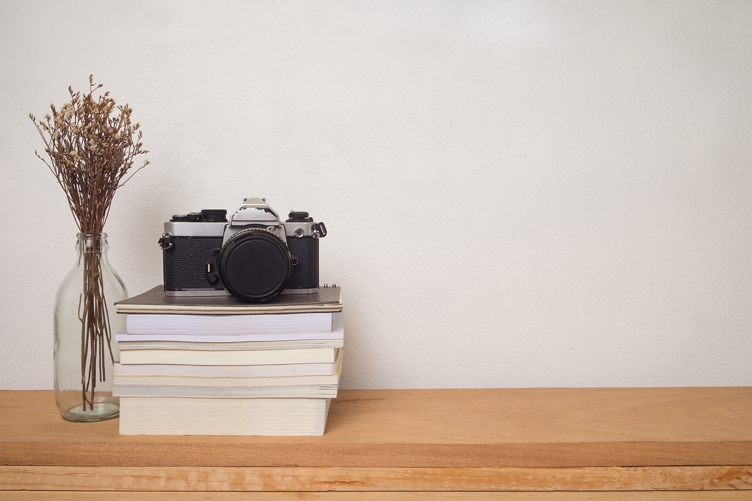 camera film photography books desk creative block
