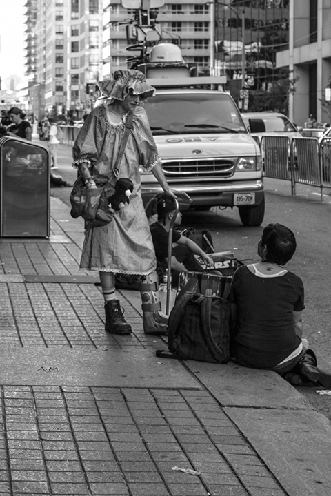 lady talking to person by the road van in background street photography portrait city people camera subject light how to tutorial guide